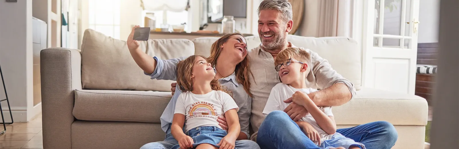 family laughing and having fun in pest free home